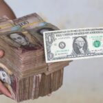 Venezuelanos correm para criptomoedas e comércio adere em massa